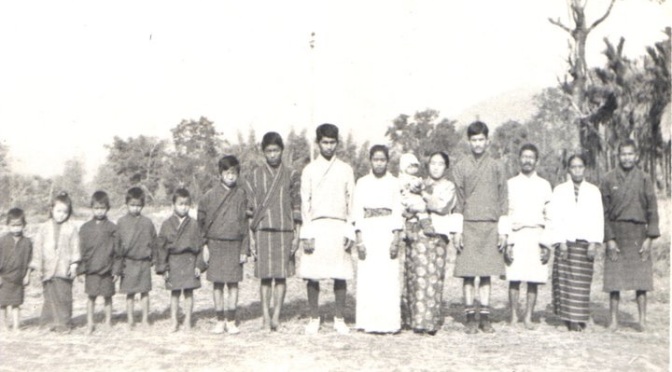 Monger family in native Bhutanese dress